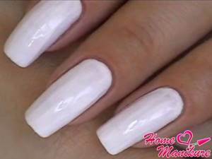 nails covered with white varnish