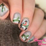 Charming nail design with bullfinches