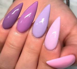 Plain purple manicure with different tones on each finger