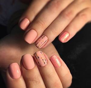 Peach manicure with design