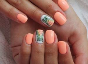 Peach manicure with owls
