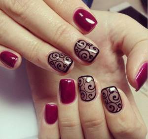 Beautiful manicure with black monograms