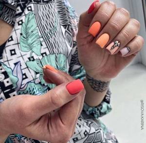 Multi-colored manicure with rhinestones
