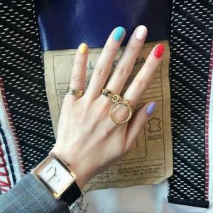 Multicolored rainbow manicure