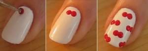 We draw a scattering of cherries on the nails with dots