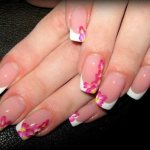 Orchid drawing on nails: photo of a delicate floral manicure