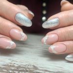 Silver manicure with glitter