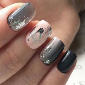Gray manicure with foil design