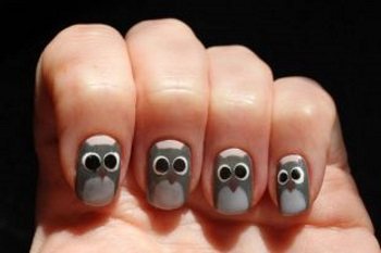 Gray manicure with owls