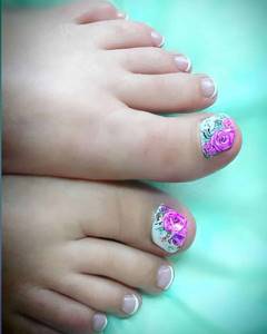 Shellac French pedicure with floral designs