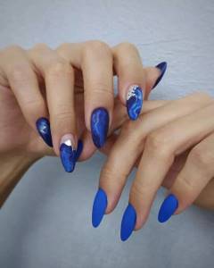 Blue manicure with design for long nails