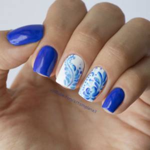 Blue manicure using Gzhel technique