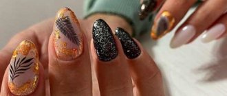 Stylish black manicure with sparkles in the photo