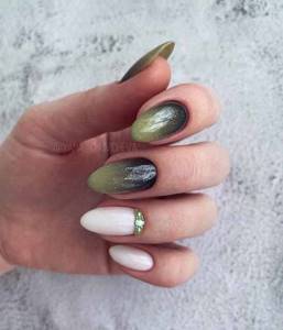 Dark olive manicure with glitter
