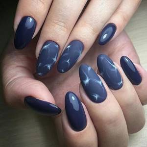 dark manicure with a pattern