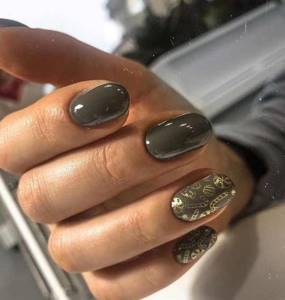dark manicure with a pattern
