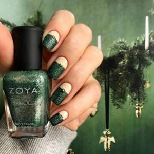 Green manicure with glitter