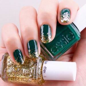 Green manicure with gold