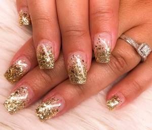 gold on the tips of the nails
